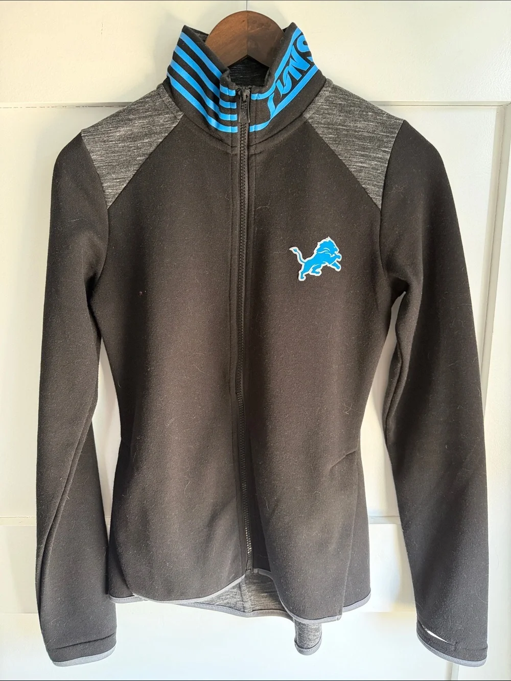 Detroit Lions NFL Black Full Zip Jacket with Blue Logo and Gray Accents